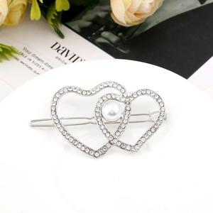 Elegant silver heart hair clip with white crystals and central pearl for women
