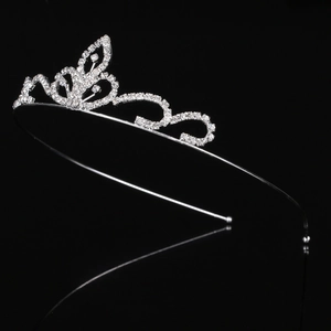 Elegant silver rhinestone crown headband for girls with butterfly and vine crystal details