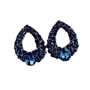 Elegant water drop earrings with navy blue rhinestones and faceted crystals in gold finish