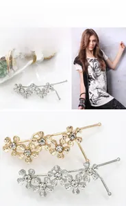 Macro detail of elegant five-leaf flower hair pins with sparkling crystal rhinestones