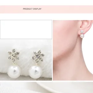 Snowflake pearl earrings with sparkling rhinestones and elegant silver drop design