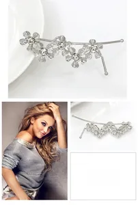 Detailed views of floral crystal hair clip with silver finish and rhinestone inlay