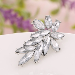 Elegant marquise cut crystal brooch with silver metal base in abstract floral design