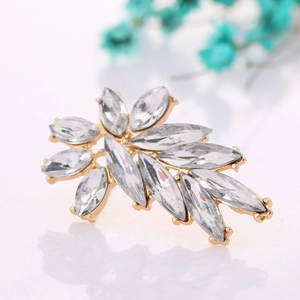 Elegant gold alloy floral earring with marquise crystal rhinestones on white mirror