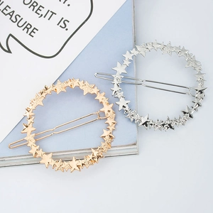 Minimalist matte star hair clips in gold and silver finish, elegant hair accessories set