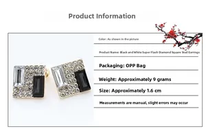 Detail view of 1.6cm geometric square stud earrings with black and white crystals
