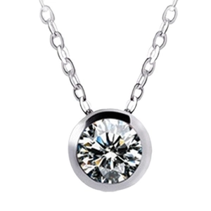 Minimalist silver necklace featuring a round solitaire cubic zirconia in a bezel setting