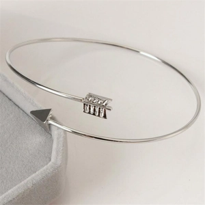 Adjustable silver alloy open cuff bracelet with minimalist cupid arrow design