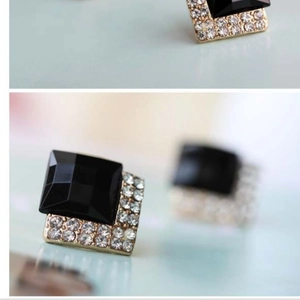 Chic gold earrings with square black crystals and sparkling rhinestone accents