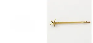Detailed view of a golden starfish hair clip crafted from premium alloy for summer styling