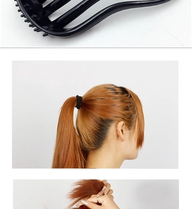 Detail view of black hair clip with comb teeth and elastic hair tie for styling