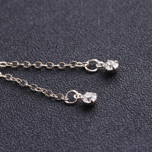 Bracelet de cheville or rose élégant avec breloques papillon et cristaux brillants