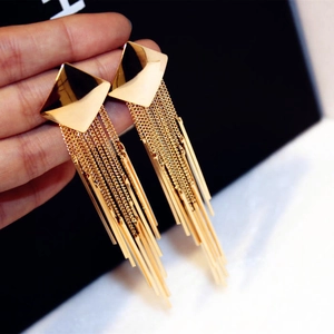 Long gold tassel earrings with geometric diamond studs and metallic fringe strands