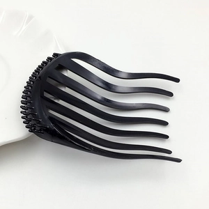 Black plastic hair volume tool with curved teeth for Korean ponytail styling and root lifting