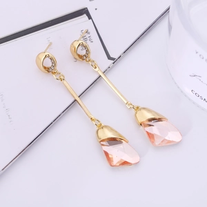 Elegant long gold earrings with pink teardrop crystals and sparkling small diamonds