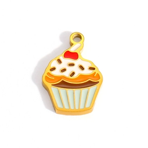 Macro view of 18K gold plated cupcake pendant with colorful enamel details and top loop