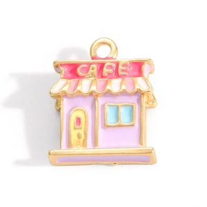 Detail shot of a pink enamel cafe pendant with golden finish for DIY necklace making