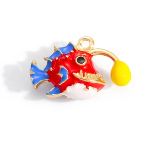 Detailed view of deep-sea anglerfish enamel pendant with 18K gold plated metal frame
