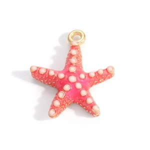 Detailed view of starfish pendant with pink enamel coating and 18K gold plated metal edges