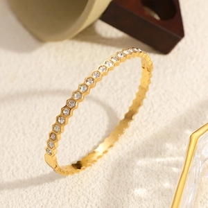 Bracelet hexagonal en nid d'abeille plaqué or 18 carats orné de zircons brillants