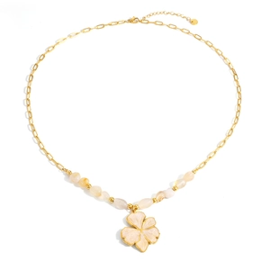 Gold stainless steel floral necklace with 18K plating and beige natural stone beads