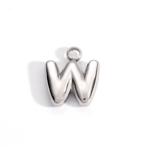 Detailed close-up of a silver polished letter W pendant with smooth mirror finish