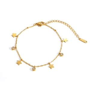 Detail of gold-plated stainless steel star bracelet with sparkling crystals and lobster clasp