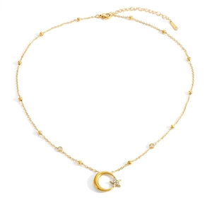 Collana minimalista dorata con ciondolo luna e stella, zirconi e catena a sfere per donna