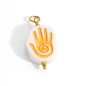 Artistic pebble shaped white pendant with orange spiral palm pattern and gold metal ring