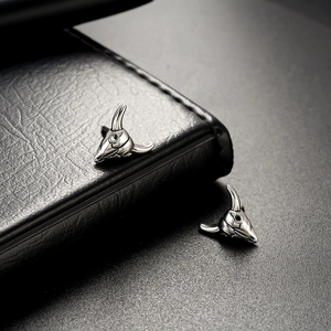 Stylish bull head stud earrings in polished silver titanium steel for men and women