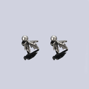 Detail of silver maple leaf stud earrings with screw back closure and leaf textures