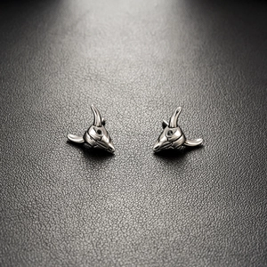 Gothic style bull skull stud earrings in polished silver stainless steel for men and women