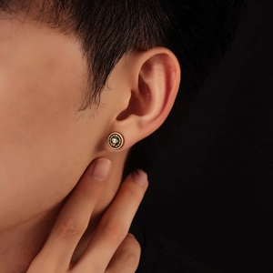 Golden Horus eye stud earring for men with Greek key pattern and white crystal zircon