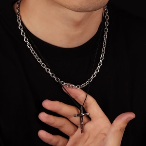 Double-layered stainless steel necklace featuring a textured silver cross pendant for men