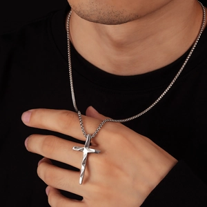 Minimalist silver cross pendant necklace with geometric cut on square chain link
