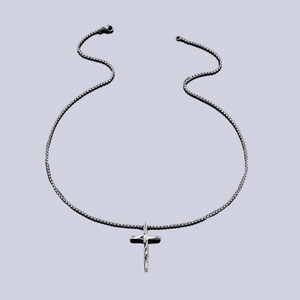 Minimalist silver cross pendant necklace with geometric faceted cut and polished chain link