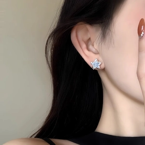 Elegant star stud earrings for women featuring silver plating and clear crystal pavé stones