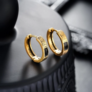 Vintage gold hoop earring for men featuring black onyx inlay and intricate carvings