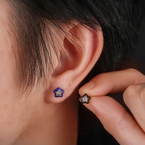Star-shaped zircon stud earrings in blue and black finish for a stylish look