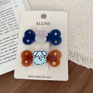 Süßes Hunde-Haarspangen-Set in Blau und Bernstein auf einer Displaykarte für Haare