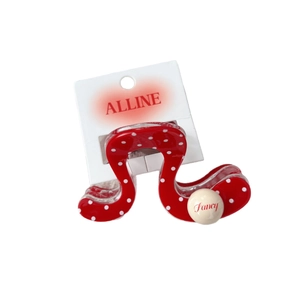 Elegant red polka dot hair clip with Fancy bead detail on brand display card