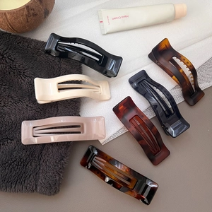 Minimalist large rectangular and curved hair claws in six elegant colors for women