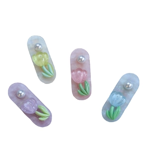 Set of four pastel tulip hair clips with pearls in yellow, pink, blue and purple