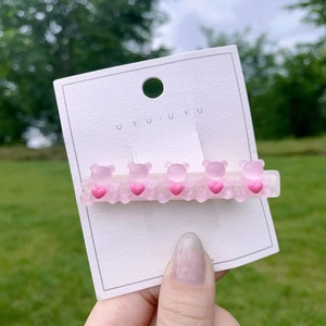 Pink candy-colored bear hair clip with hearts on sweet girls duckbill hair accessory
