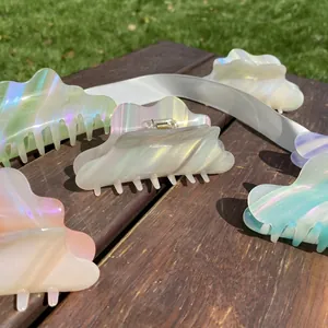 Cloud shaped iridescent acetate hair claw clips in assorted pastel candy colors for women