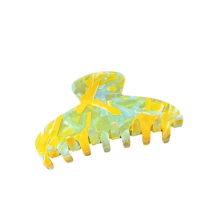 Large marbled acetate claw clip in vibrant yellow and mint green jelly finish