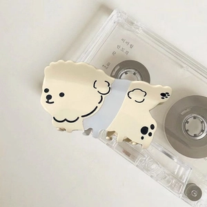 Cute cream acetate puppy hair claw clip for women featuring a cartoon dog design