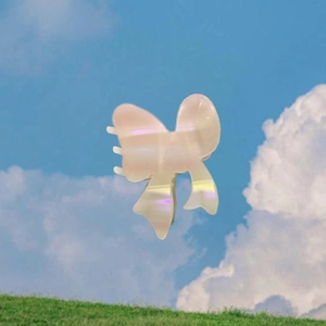 Pince à cheveux nœud papillon en acétate irisé aux reflets nacrés colorés