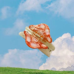 Cute red mushroom hair claw clip with acetate finish and white spots for girls