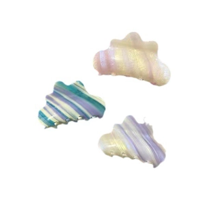 Three colorful acetate cloud-shaped hair claws with pearlescent rainbow stripes